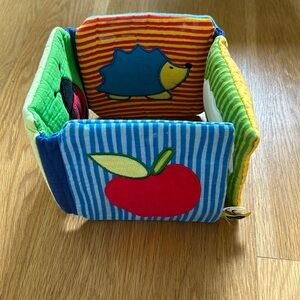 Picture book with rattle in fabric, made in Germany!